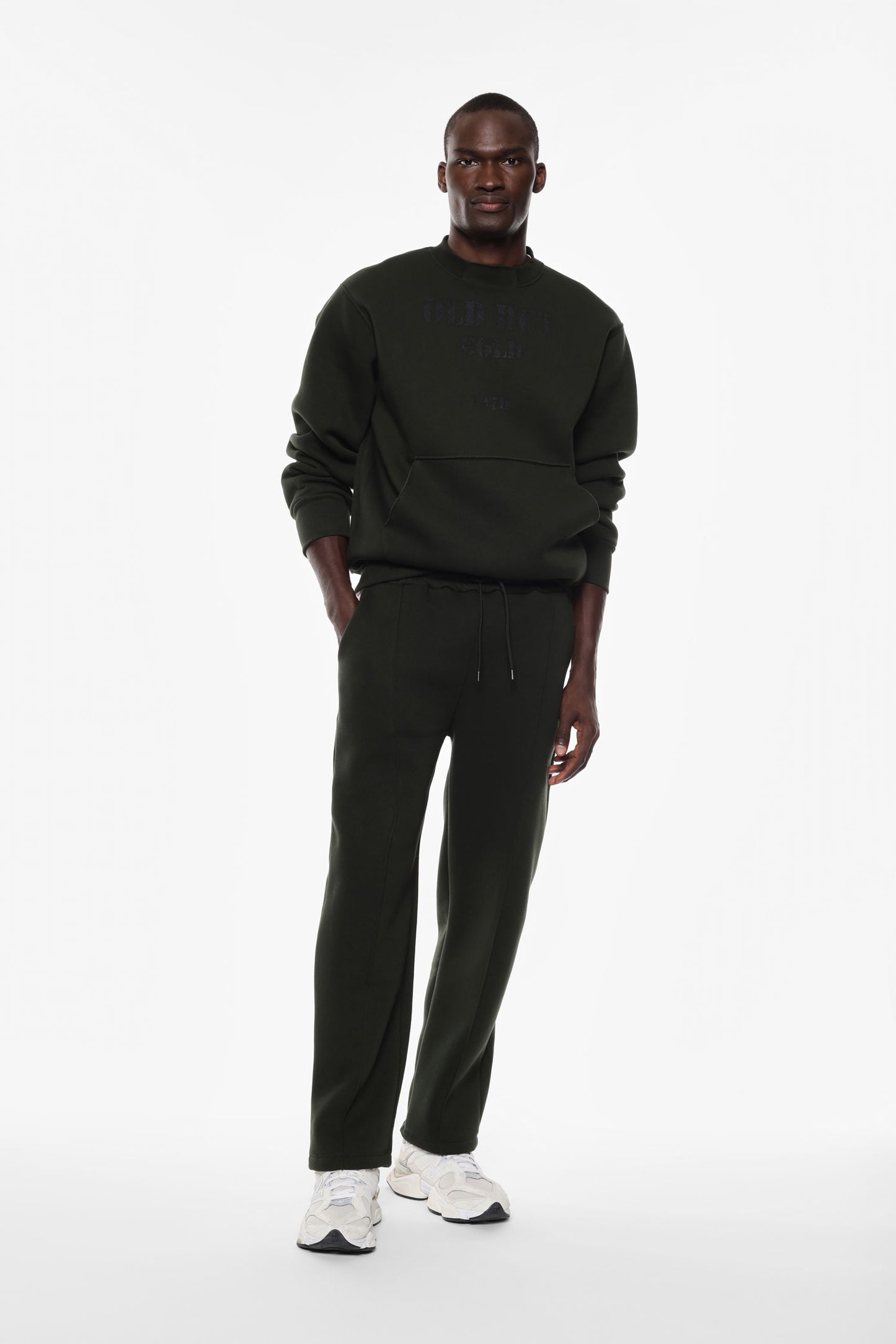 Pantaloni jogging con coulisse e logo laterale