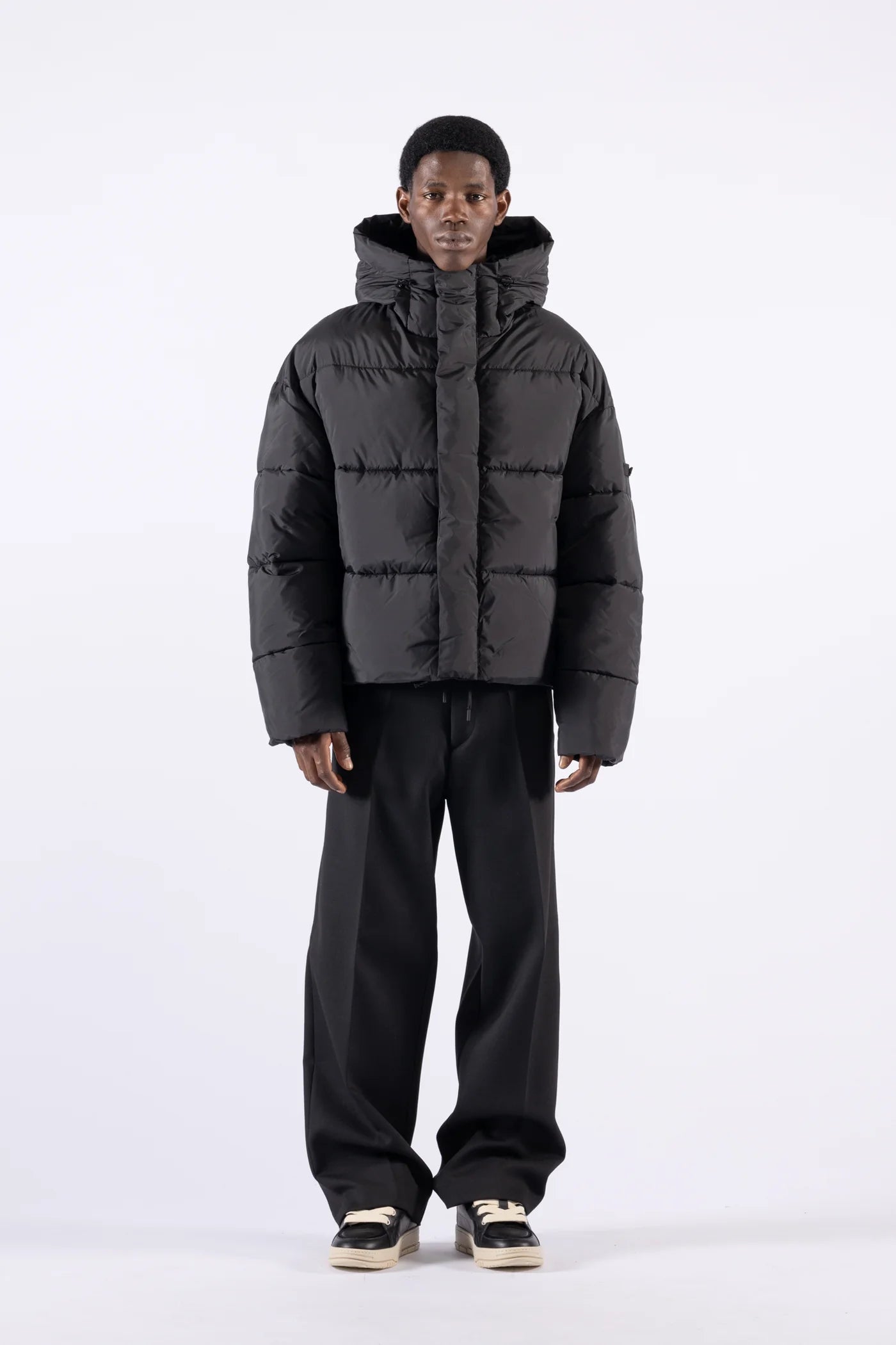 Piumino oversize con cappuccio - Nero