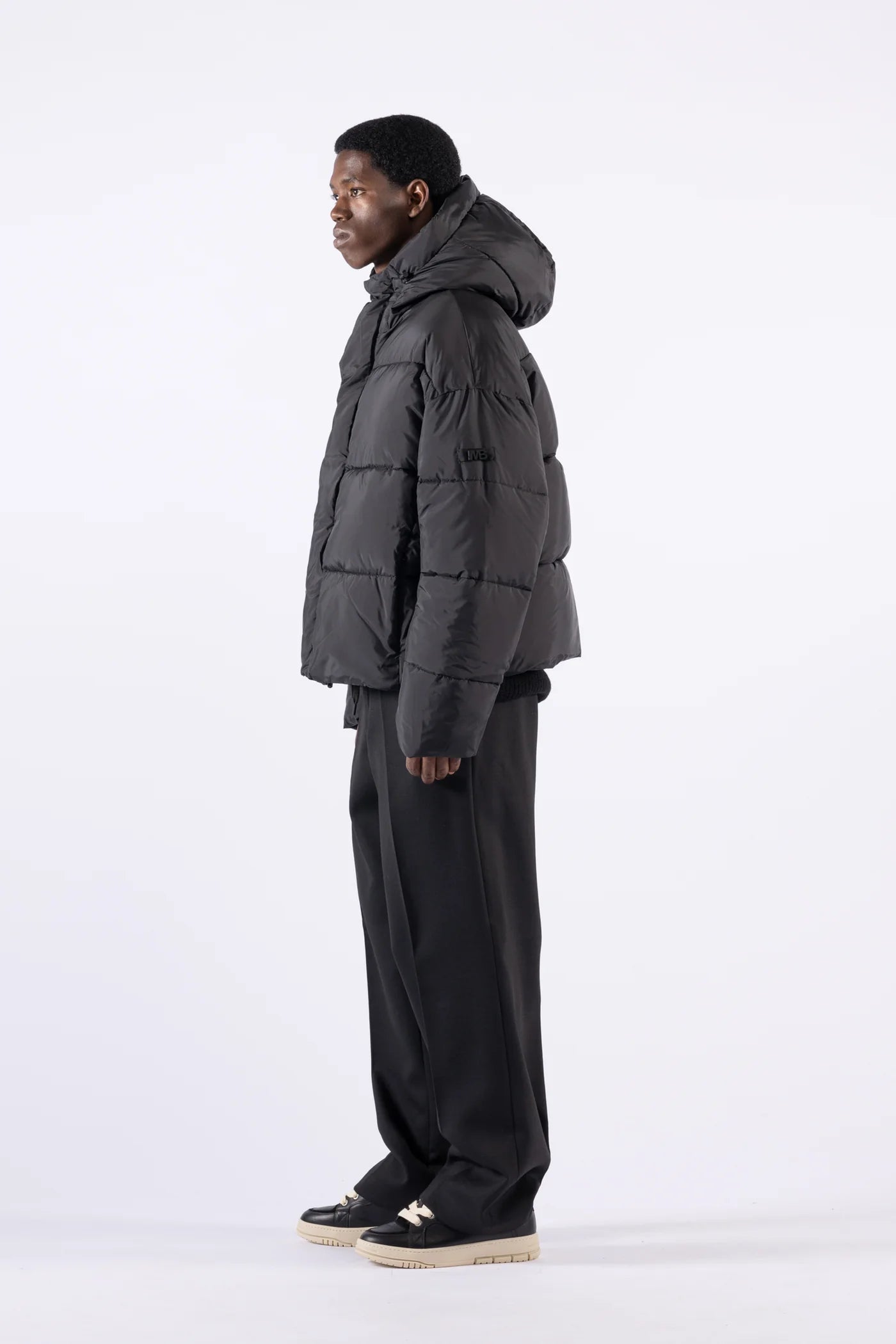 Piumino oversize con cappuccio - Nero