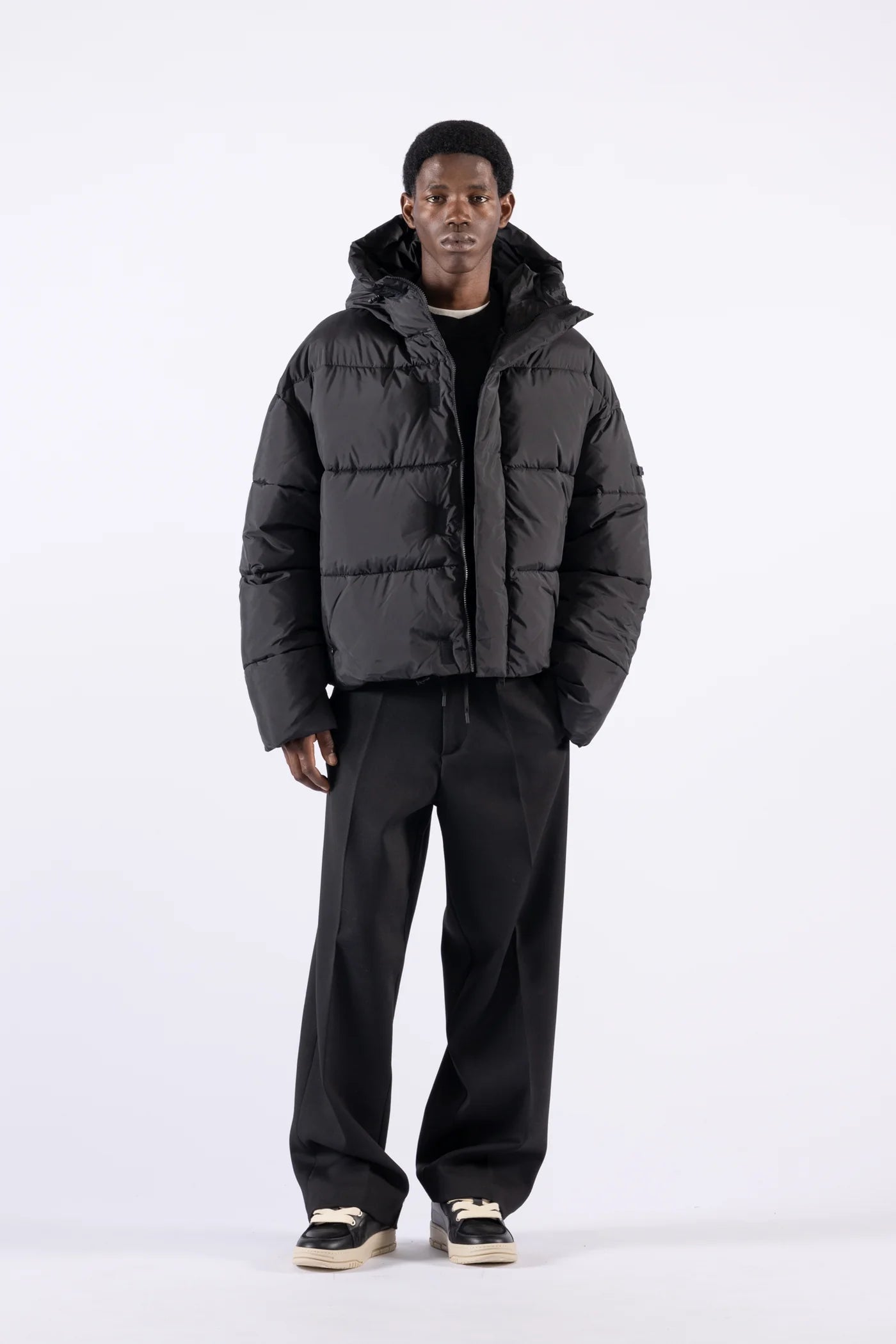 Piumino oversize con cappuccio - Nero